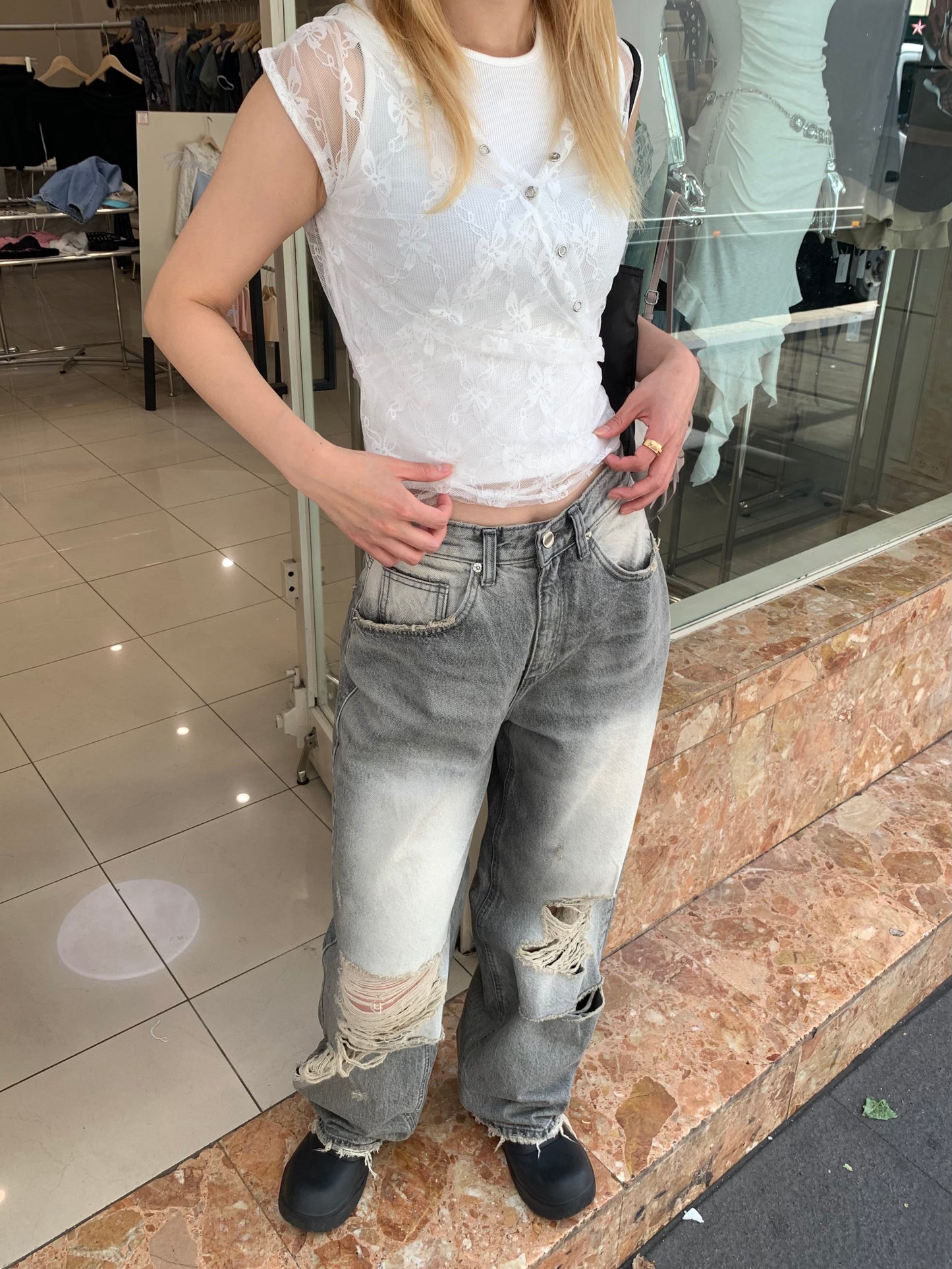 Light gray ripped jeans
