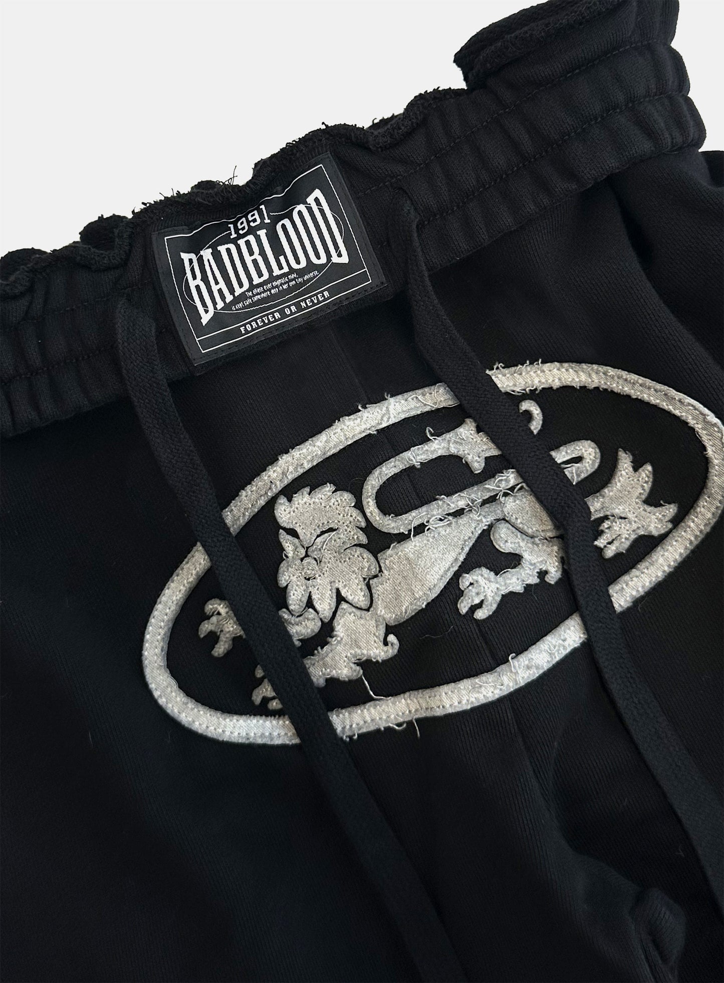 Lion Patch 2 Way Curved Jogger - Washed Black