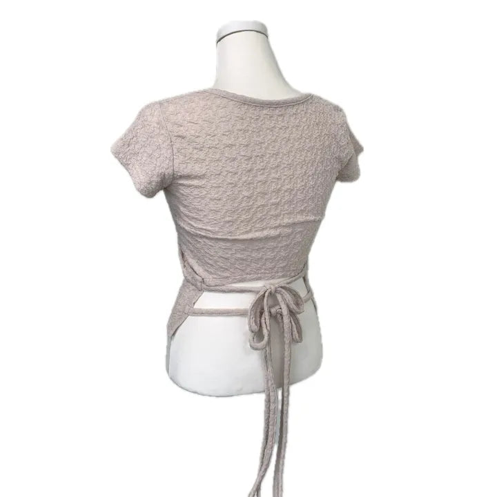 Embo back details top