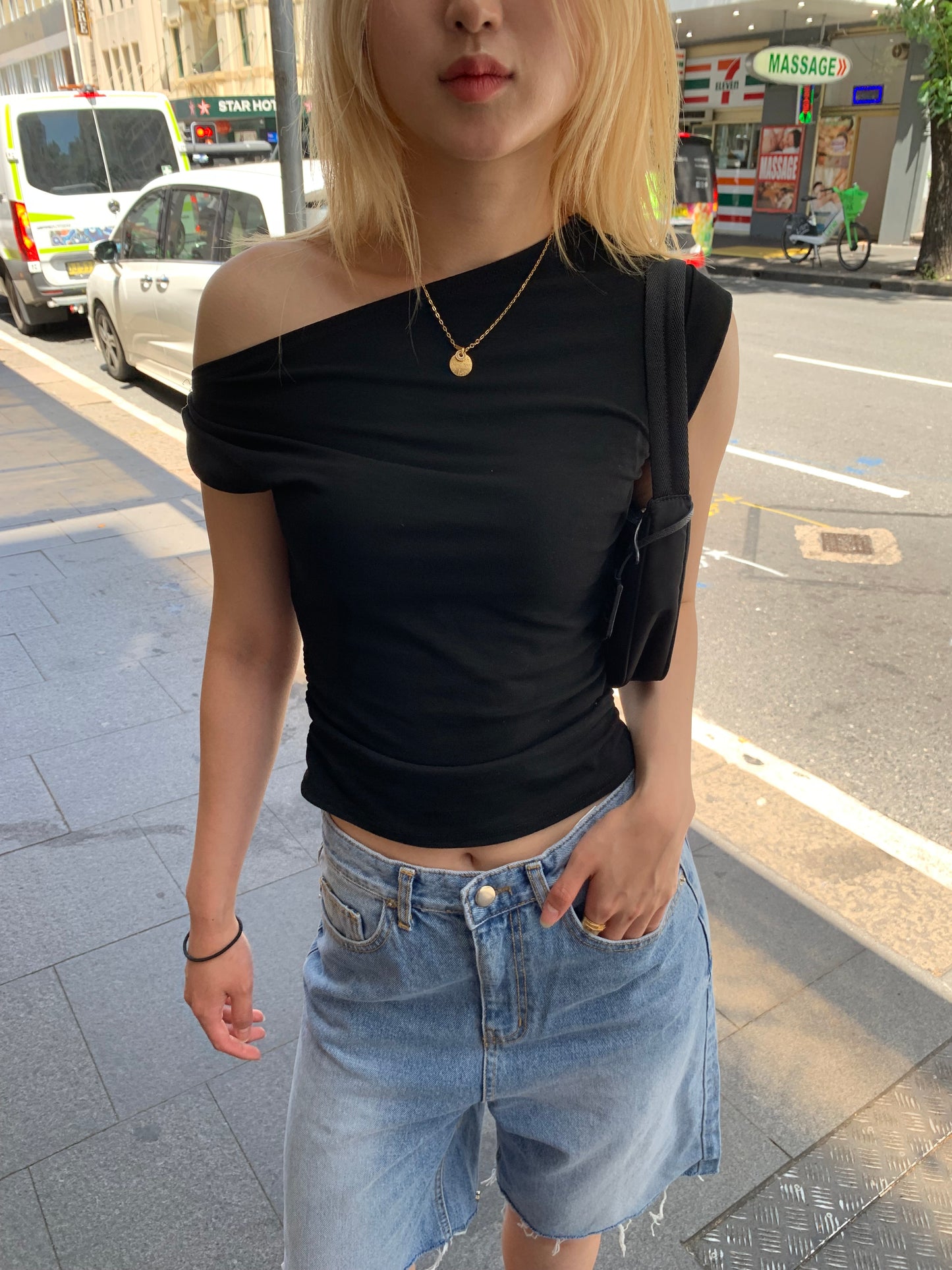 Asymmetrical neck top
