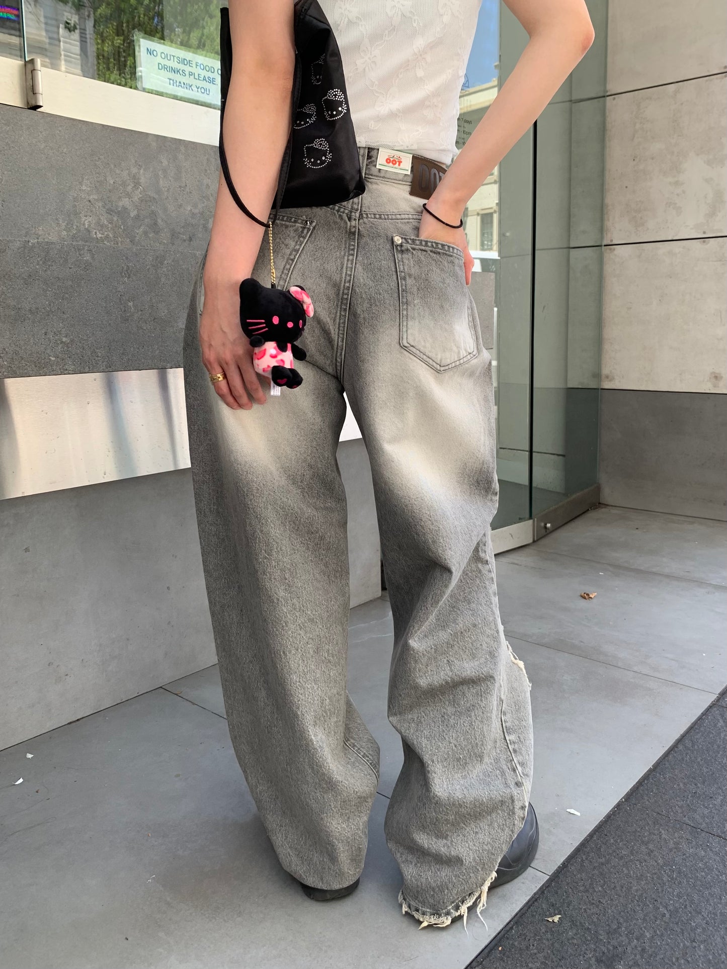 Light gray ripped jeans